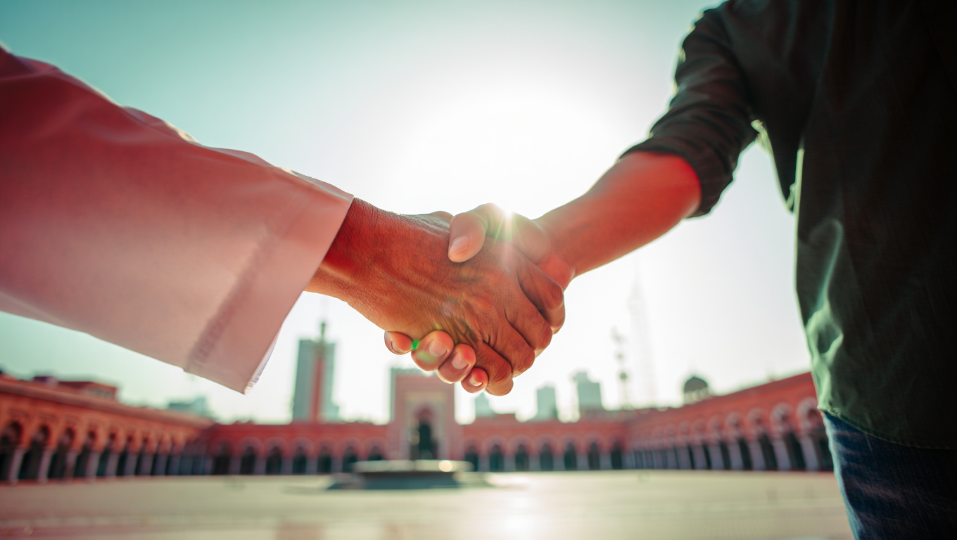 Handshake of imam and youth — unity of fronts